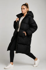 Women's long black puffer coat with hood and casual streetwear