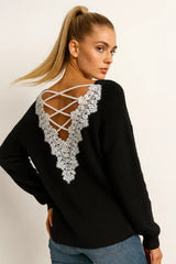 Women’s black knit sweater with white lace-back detail – elegant open-back top
